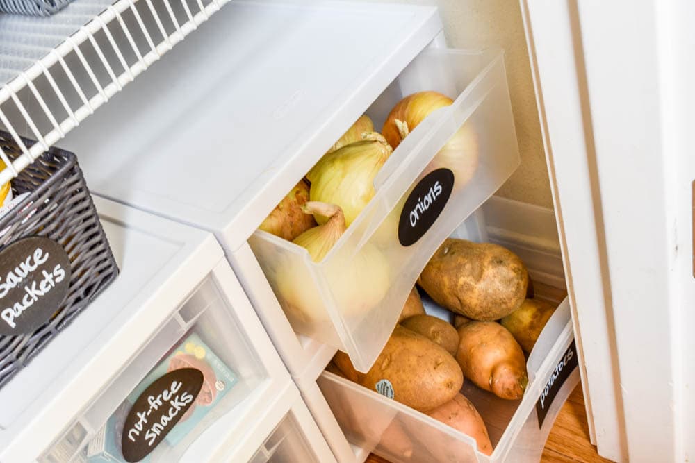 This small organized pantry closet  on a budget with shelves and baskets is full of cheap and easy ideas to keep all your food visible and easy to access!