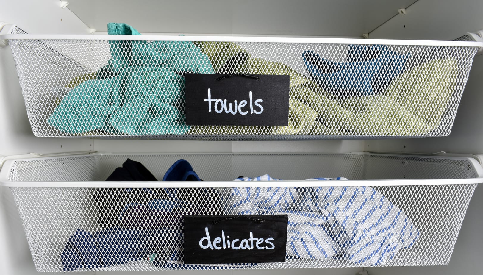photo of laundry room with painted chalkboard labels