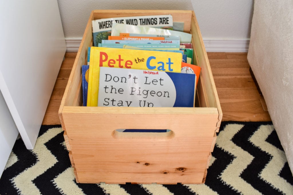 photo of wood crate of children's books