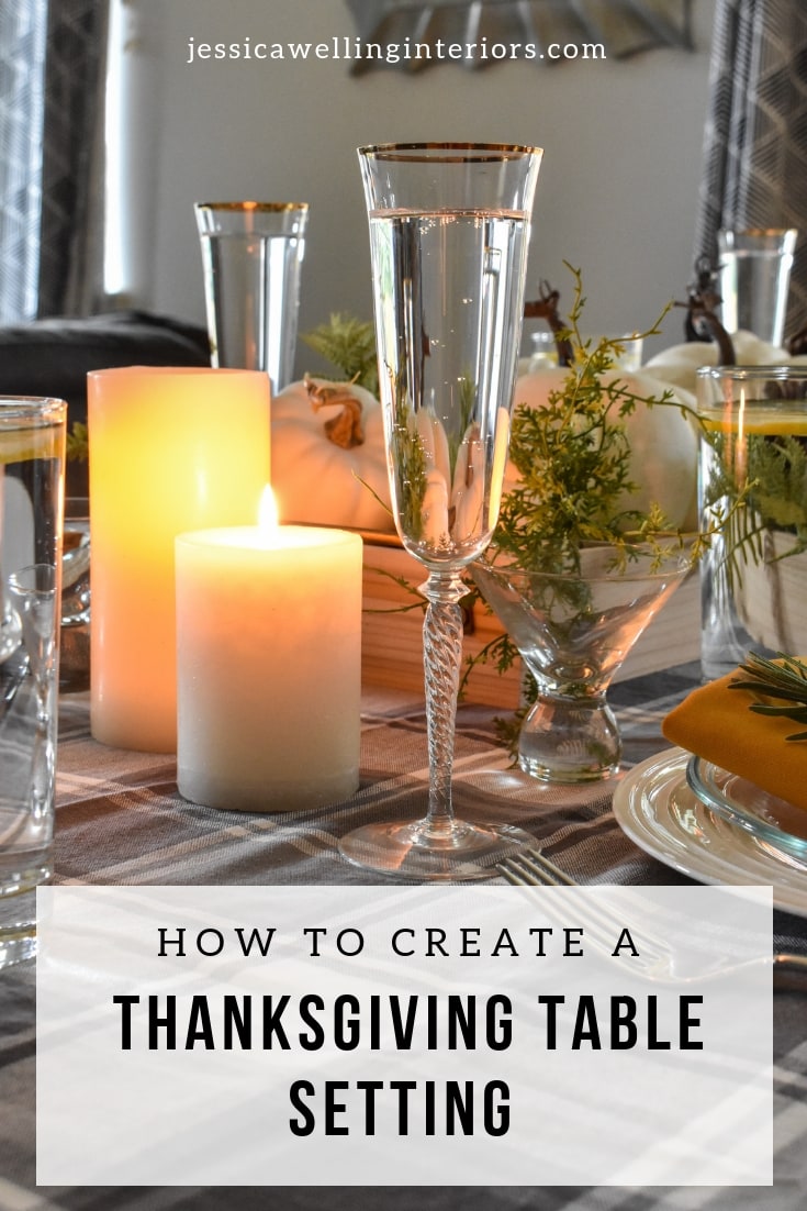 image of Thanksgiving table setting with candles, white pumpkins, & champagne flutes