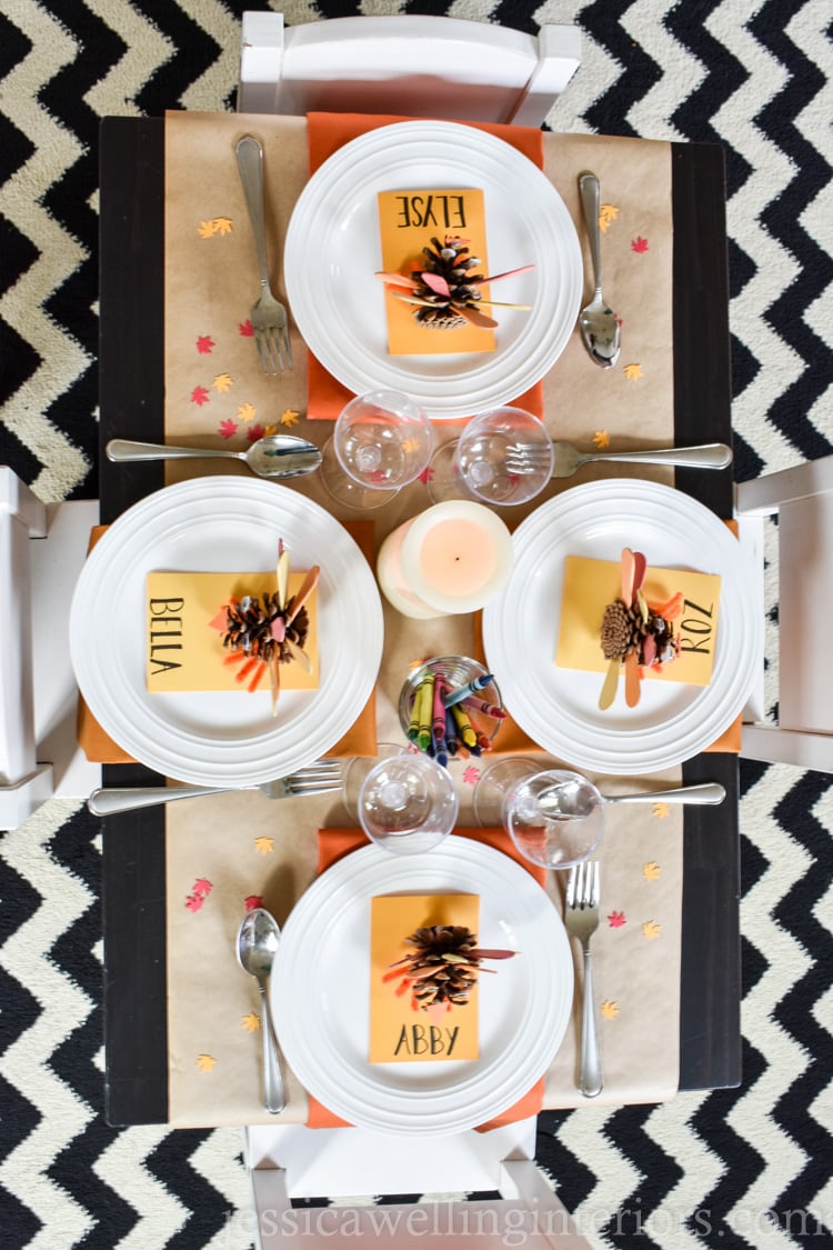 image of thanksigiving kids table with pine come turkeys and crayons