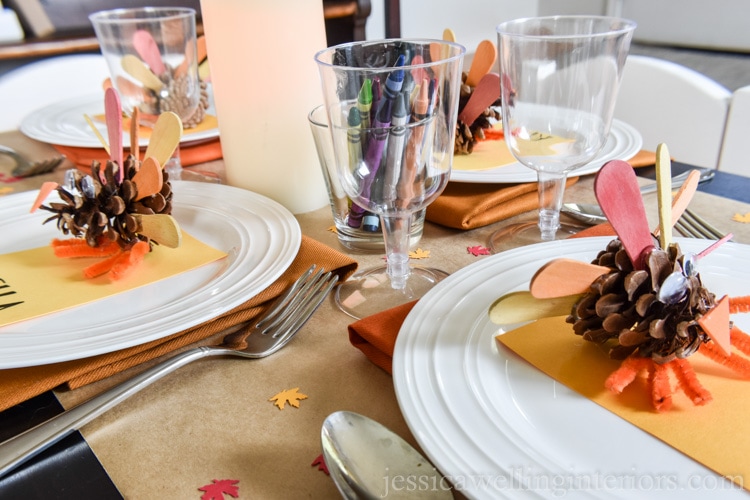 image of Thanksgiving kids table with pine cone turkeys and crayons