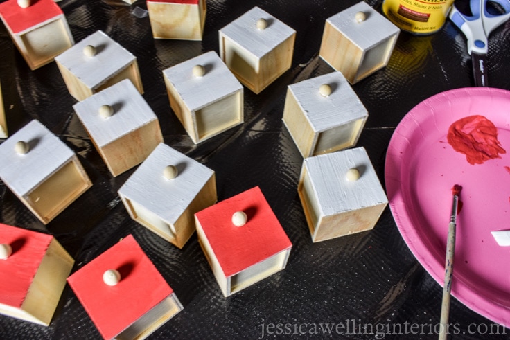 drawers from reusable advent calendar, being painted red and white