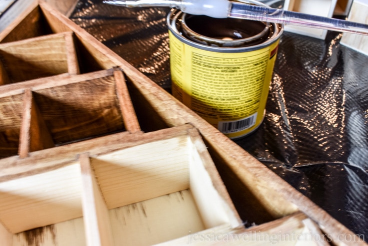 wood advent calendar being stained and painted for Christmas