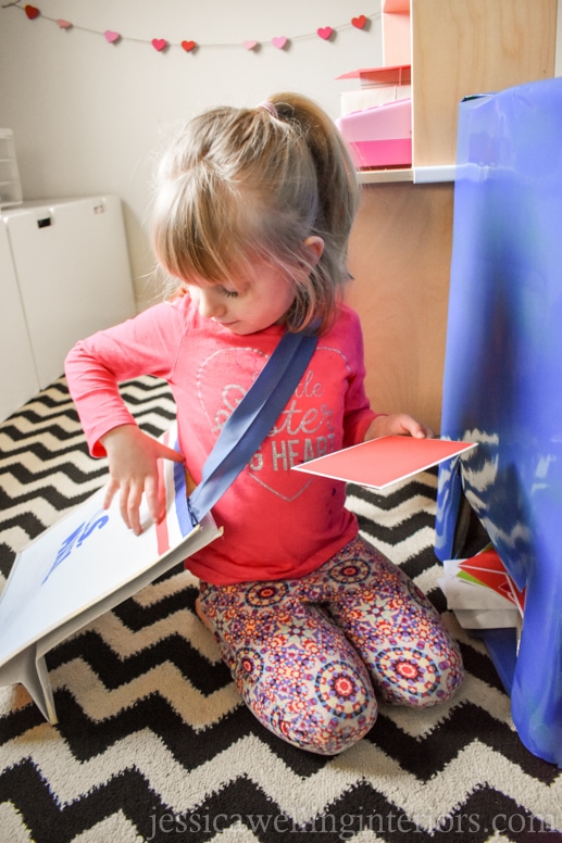 image of child playing in play post office for Valentine's Day