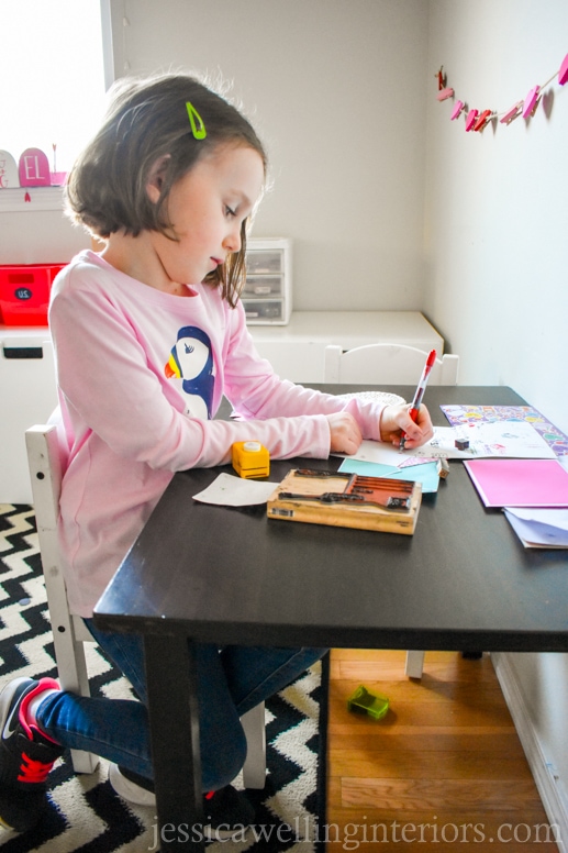 image of child playing in play post office for Valentine's Day