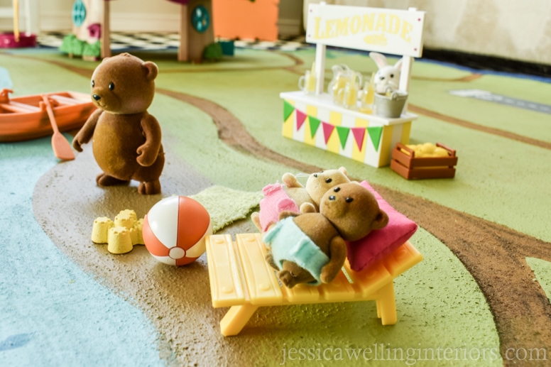 This easy DIY painted play rug is perfect for Li'l Woodzeez, Calico Critters, Little People, and more! It's the perfect mat for hours of imaginative play!﻿