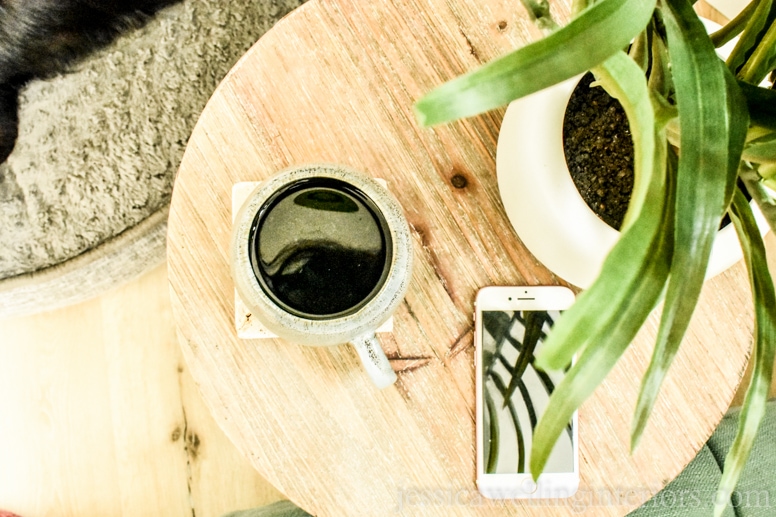 image of mug on end table with kintsugi tile coaster