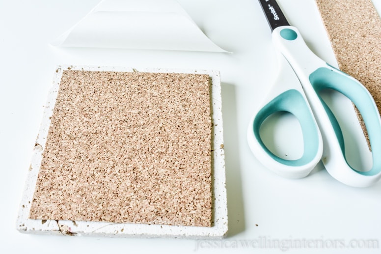 image of someone putting cork back on kintsugi tile coaster