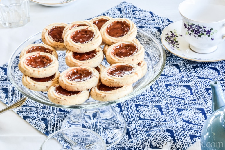 image of blue and white Mother's Day Tea party table setting with jam thumbprint cookies