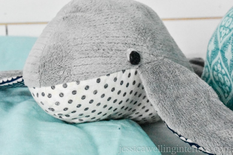 homemade stuffed whale on a bunk bed