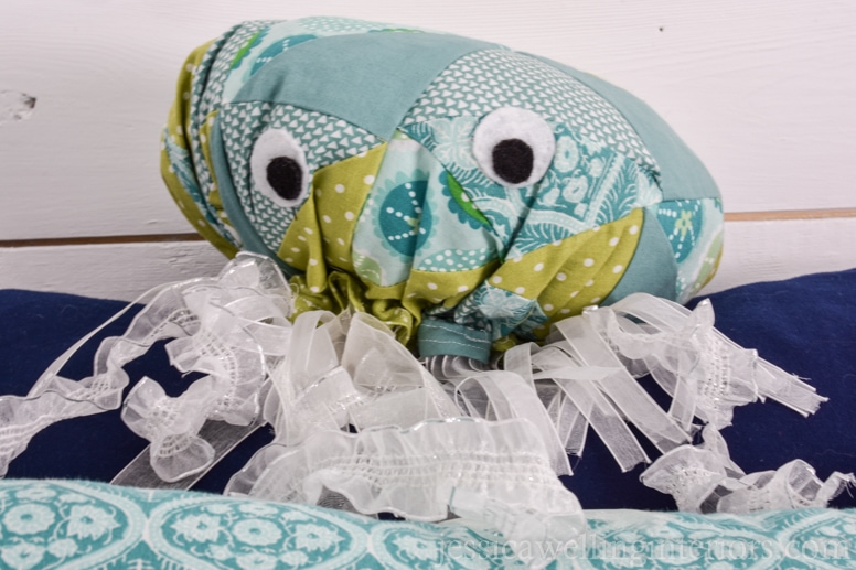 homemade stuffed jellyfish toy on a child's bunk bed