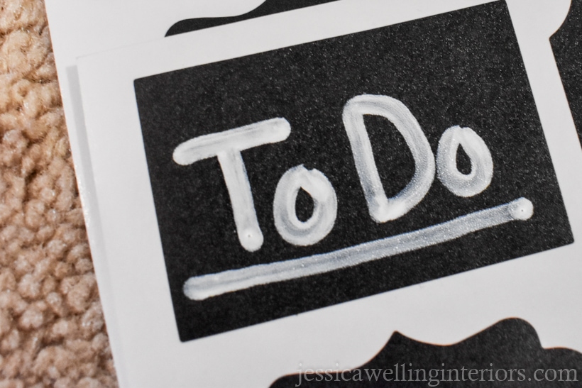 chalkboard sticker label with the words. "To Do" written and underlined in white paint pen