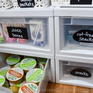 school lunch packing-station in bottom of pantry closet with plastic drawers