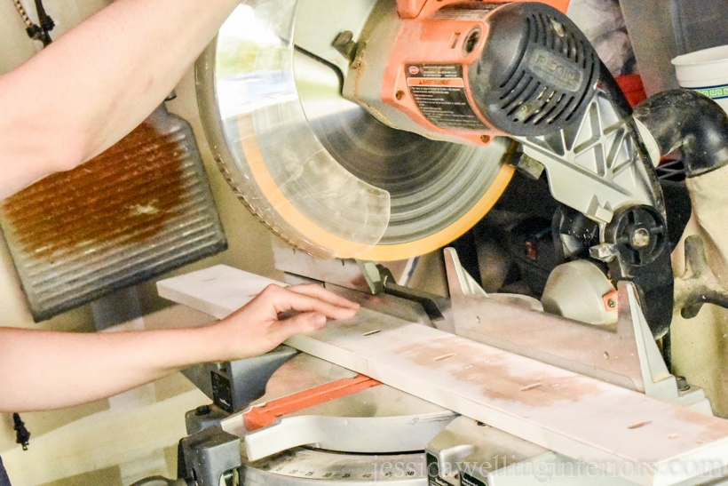 IKEA KUBBIS hooks rack being cut in half with miter saw