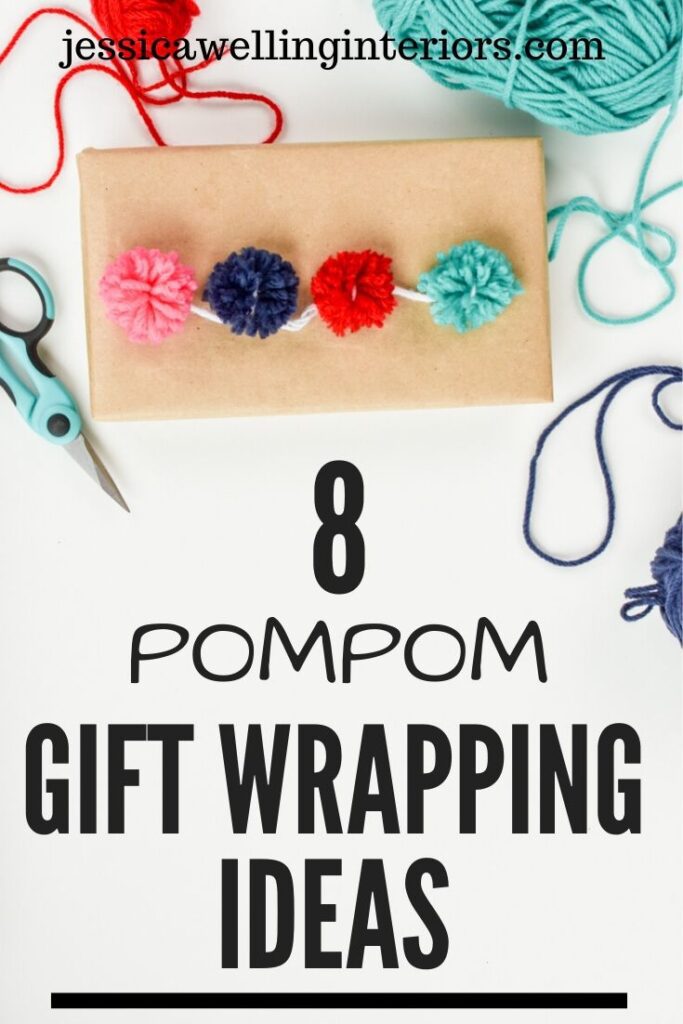 8 Pompom Gift Wrapping Ideas: small brown paper-wrapped gift with string of mini colorful pom poms on top. Yarn and craft scissors next to it