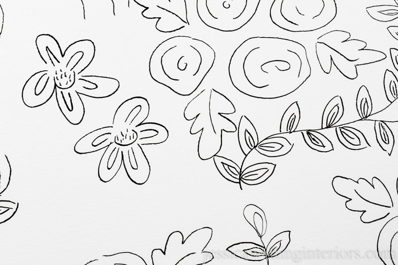 close-up of floral print drawn on wall to look like wallpaper