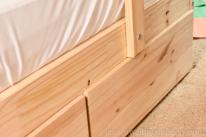 close-up of bottom of IKEA MYDAL bunk bed with under-bed storage hack