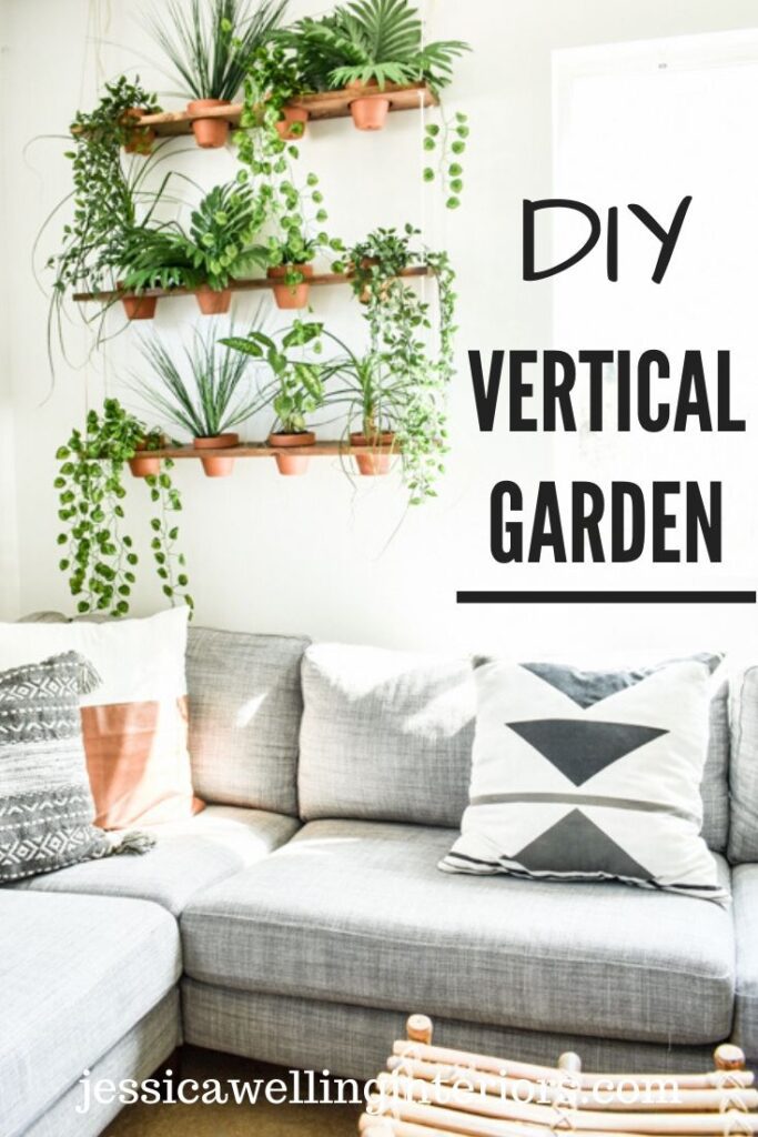 DIY indoor vertical garden: indoor hanging plants on a wall above a sofa with Boho decor