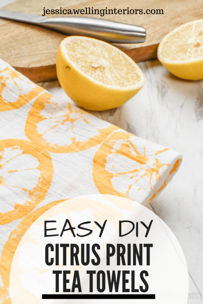 Easy DIY Citrus Print Tea Towels: white four sack dish cloth with yellow  lemon print on a marble counter