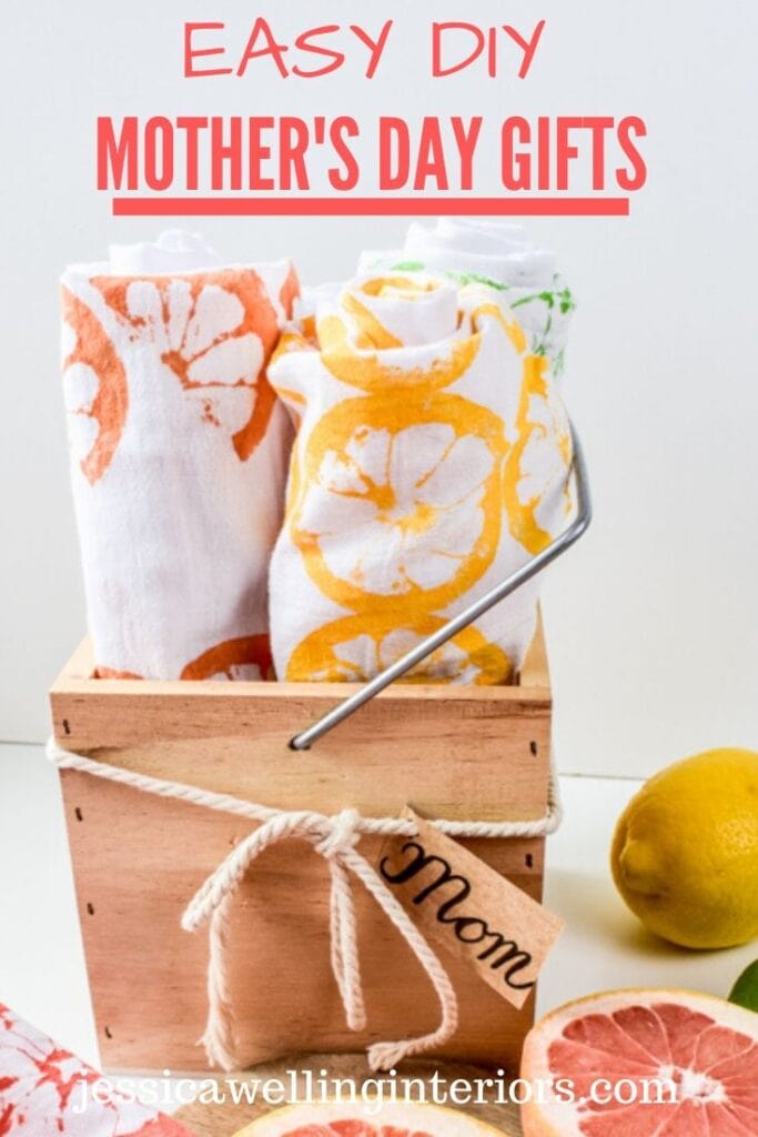 Easy DIY Mother's Day GIfts: diy citrus-printed tea towels rolled up in a wood crate labeled with to: mom