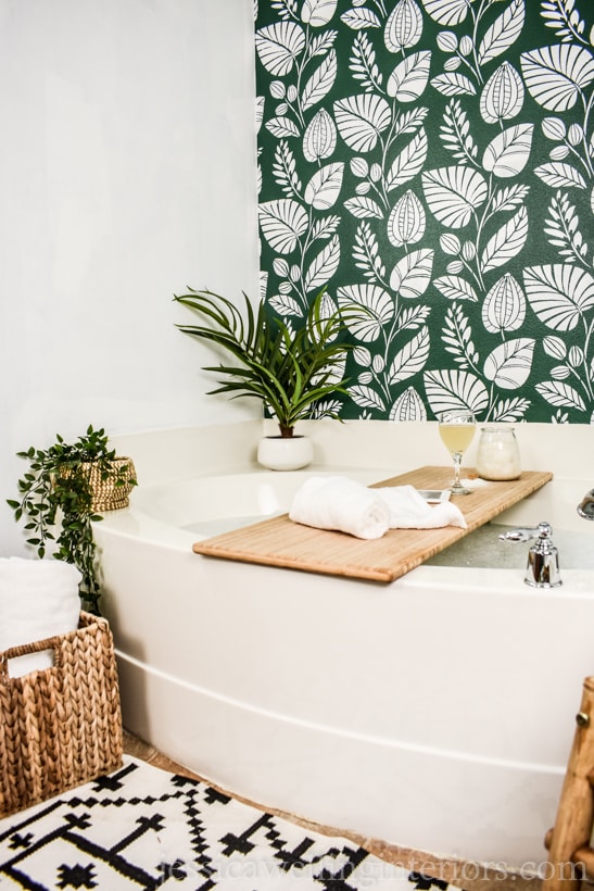 bathroom with a stenciled accent wall created with a wall stencil