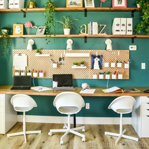 distance learning desk with three workstations and open shelving above