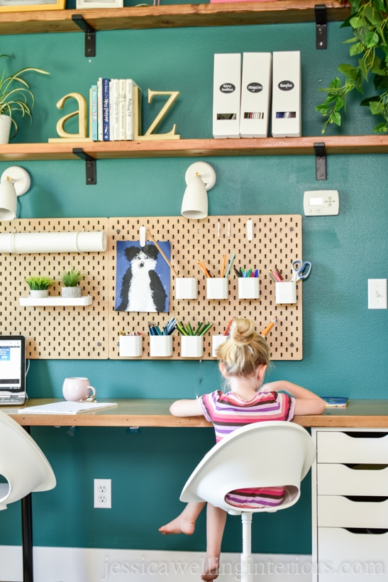 This modern homeschool and distance learning room is full of Ikea hacks and organization ideas on a budget! It includes individual workstations, perfect lighting for Zoom meetings, and much more!
It's perfect for older kids and younger kids alike!