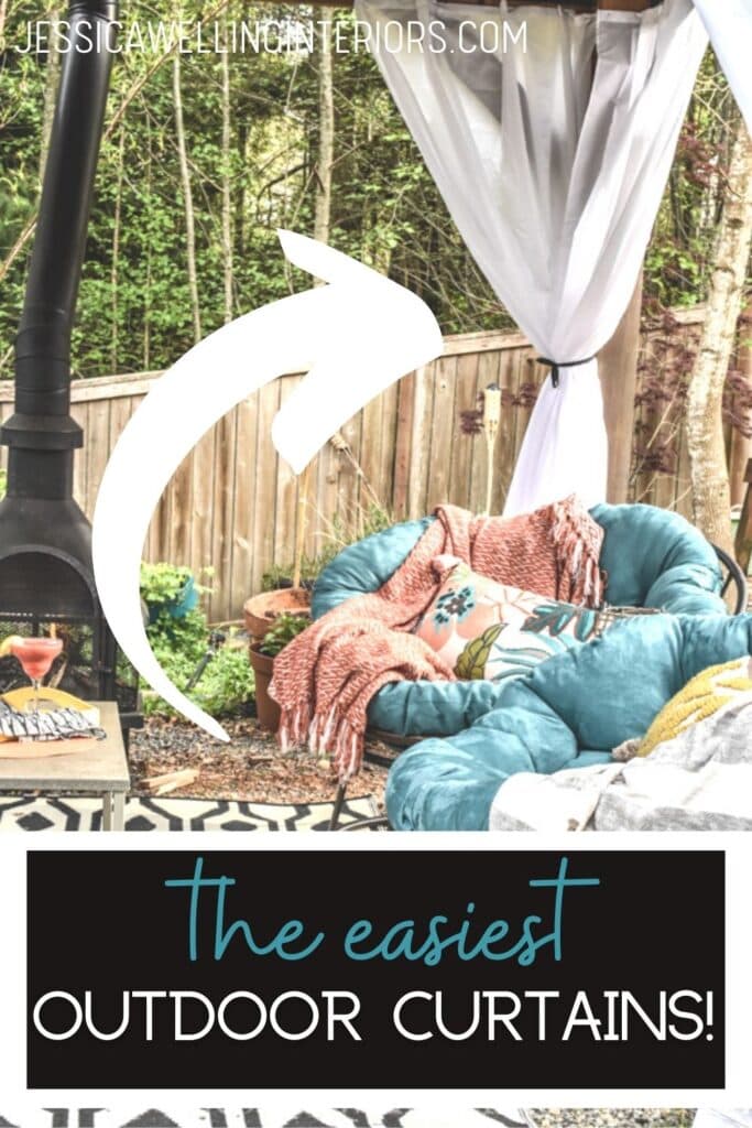 The Easiest Outdoor Curtains! outdoor living room with white curtains tied back, papasan chairs, and a fire pit