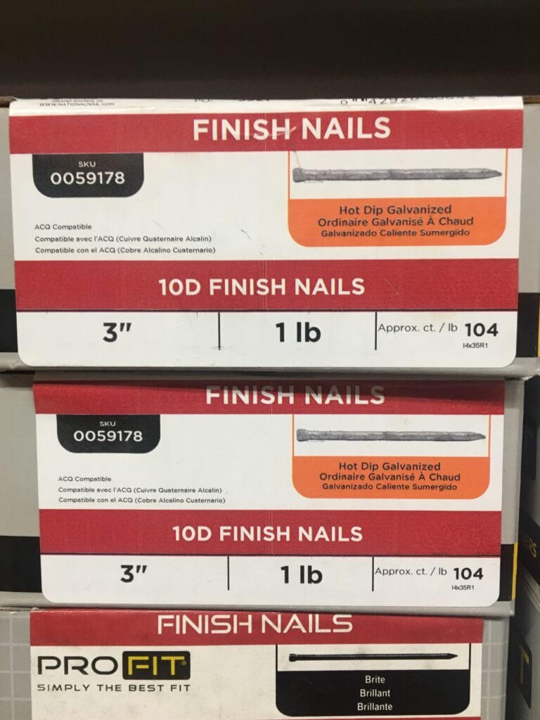 boxes of 3" finish nails stacked at a hardware store