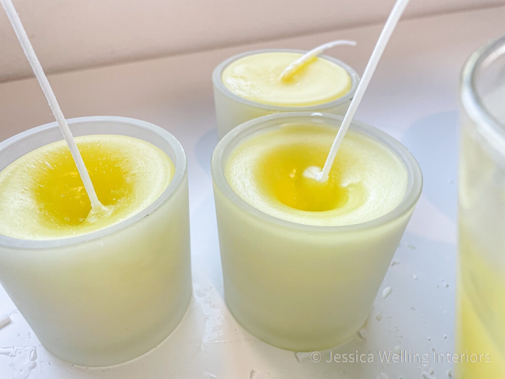 close-up of tops of citronella candles after the first pour