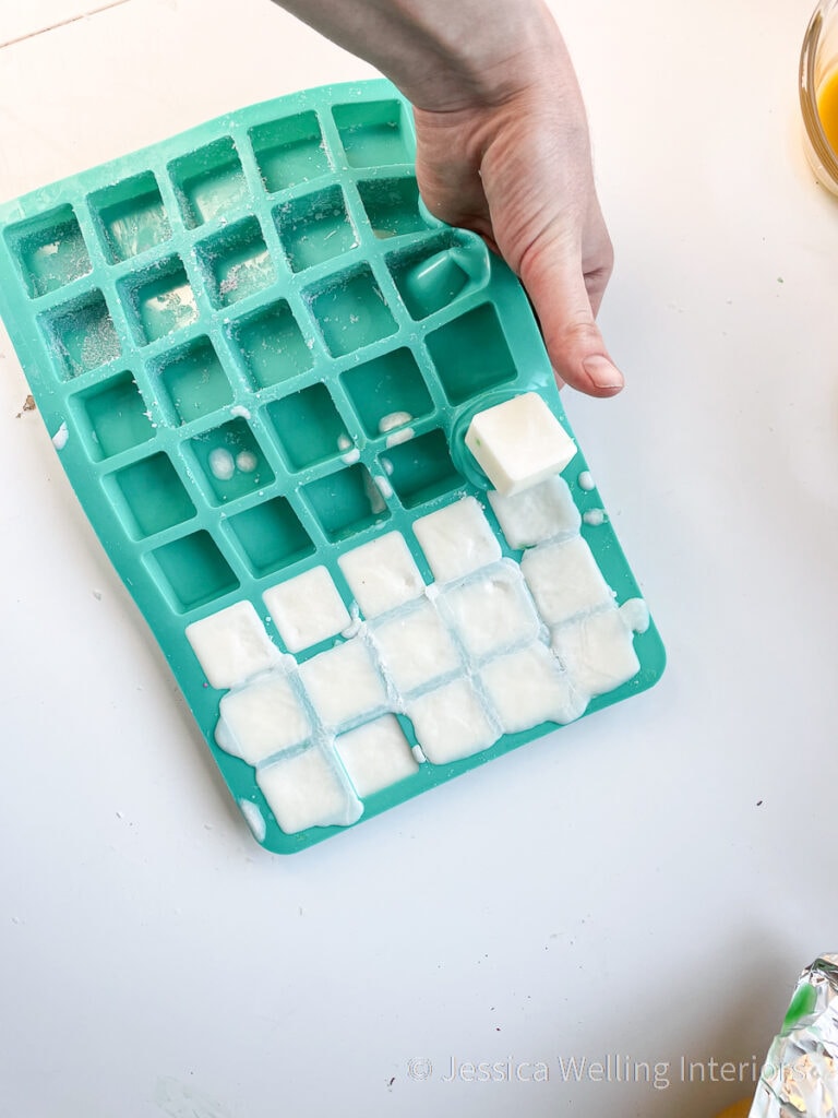 DIY wax melts being removed from a silicone wax melt mold