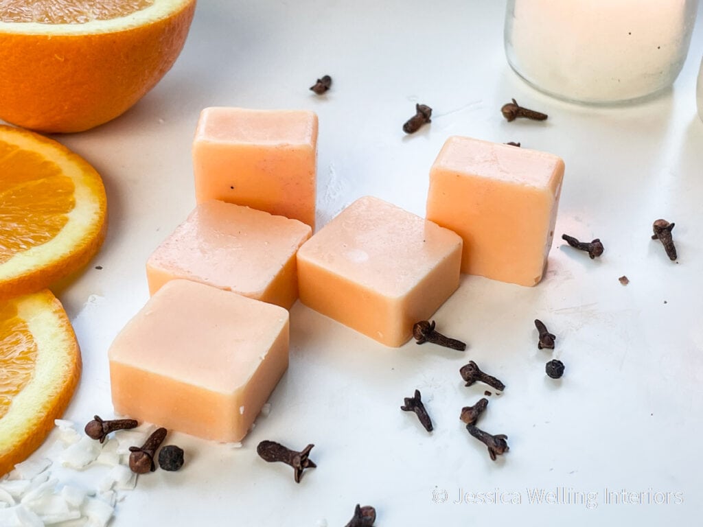 close up of orange clove scented wax melts