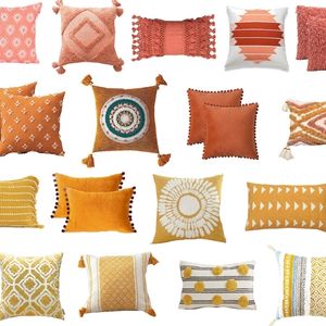 collage of fall pillow covers in orange, yellow, coral, and white