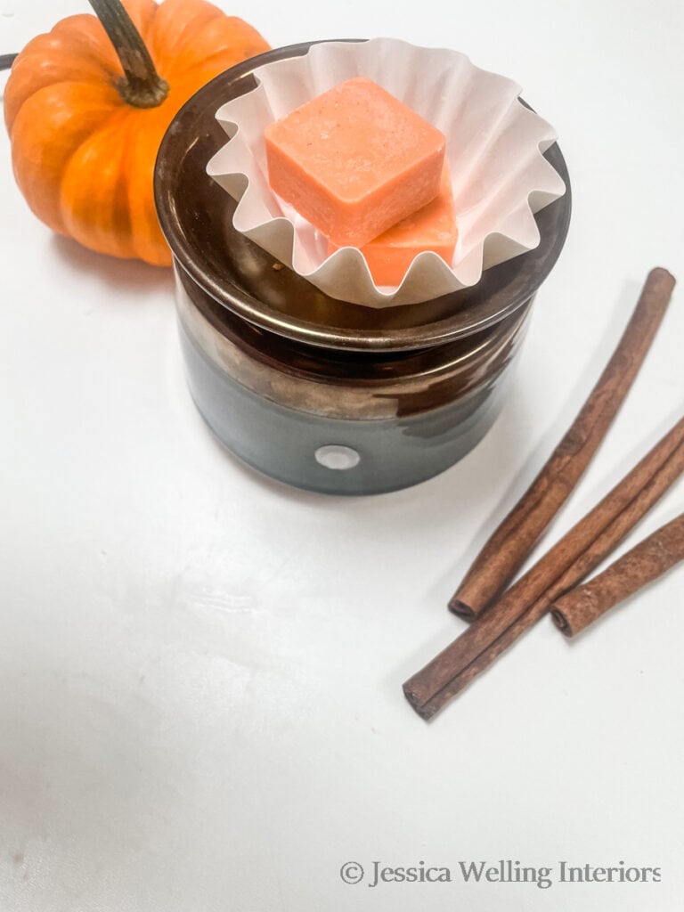 pumpkin-scented wax melts in a wax warmer