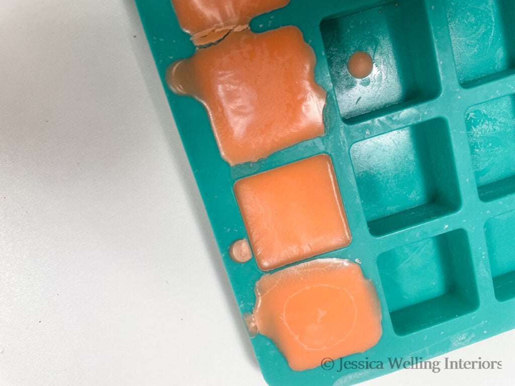 square-shaped silicone wax mold with cooled wax melts