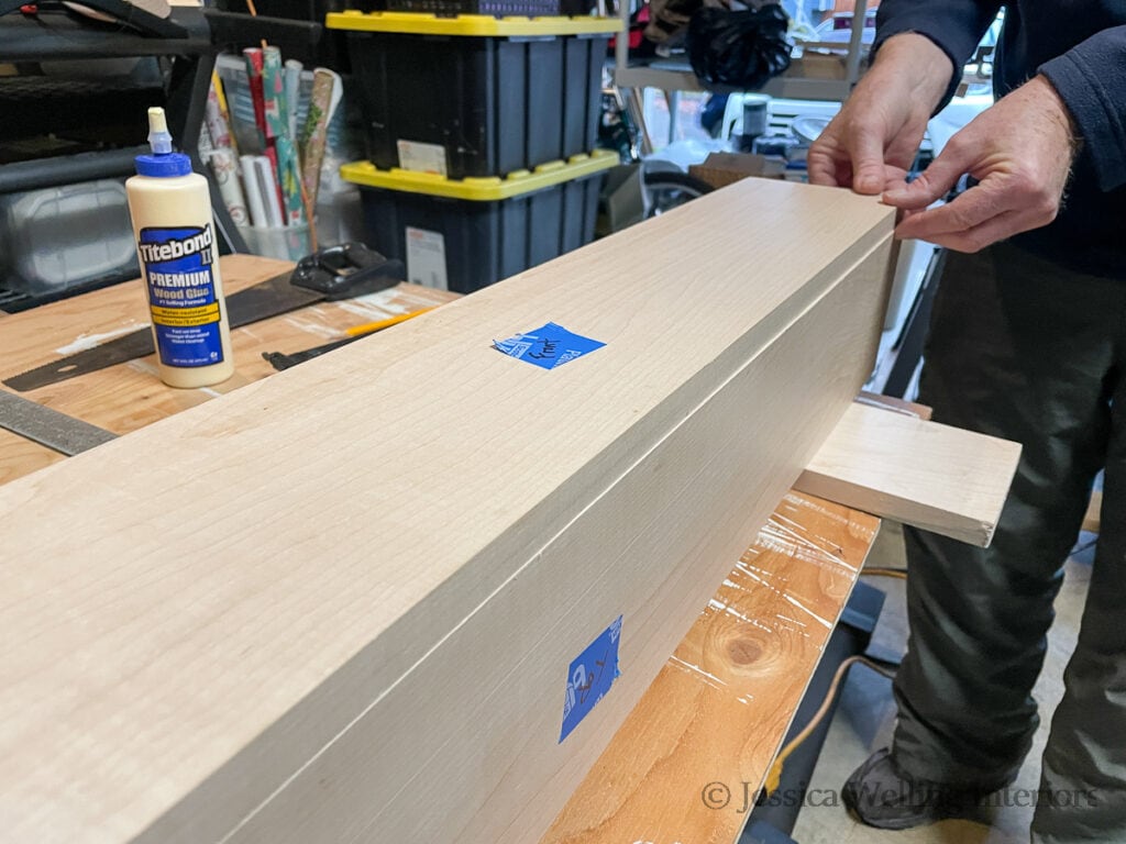 wood mantel being assembled