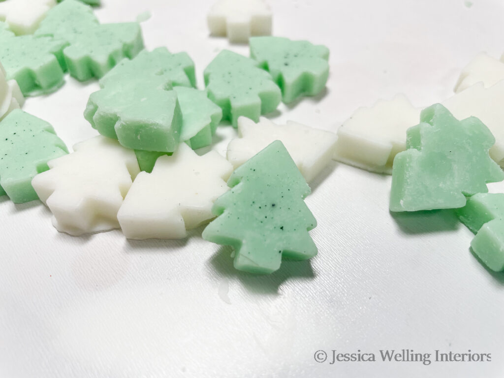 close up of green and white Christmas tree shaped max melts  using Tree Sap & Fir candle fragrance oil