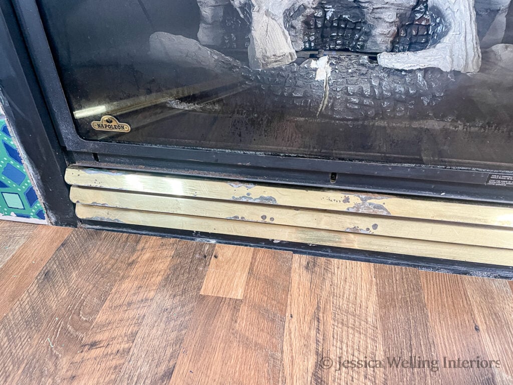 close-up of gas fireplace insert with corroded grate