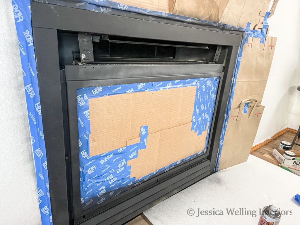 fireplace insert drying after 1st coat of high heat spray paint has been applied