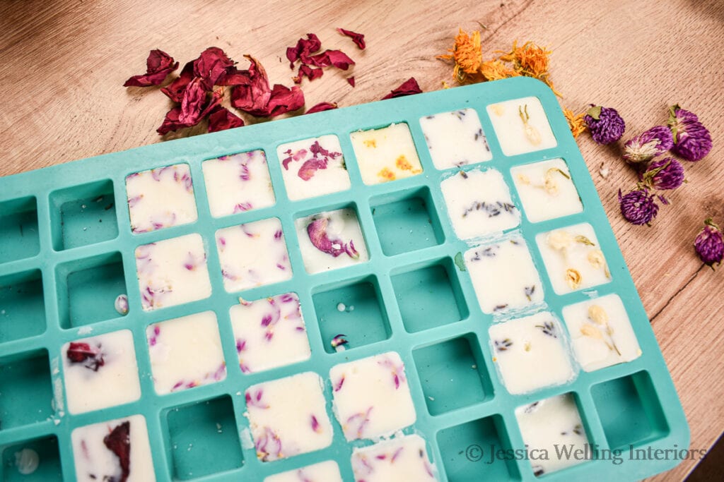 silicone wax melt mold with 6 different varieties of floral scented wax melts and dried flower petals