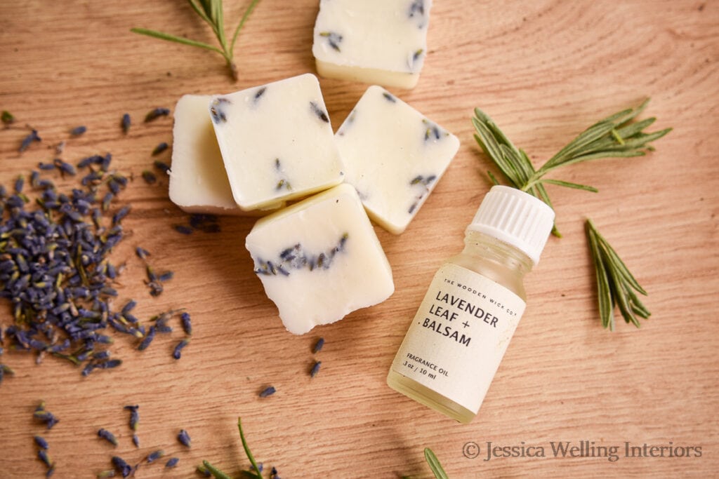 wax melts with dried lavender flowers embedded in them scented with Lavender Leaf & Balsam fragrance oil for candles, from The Wooden Wick Co.