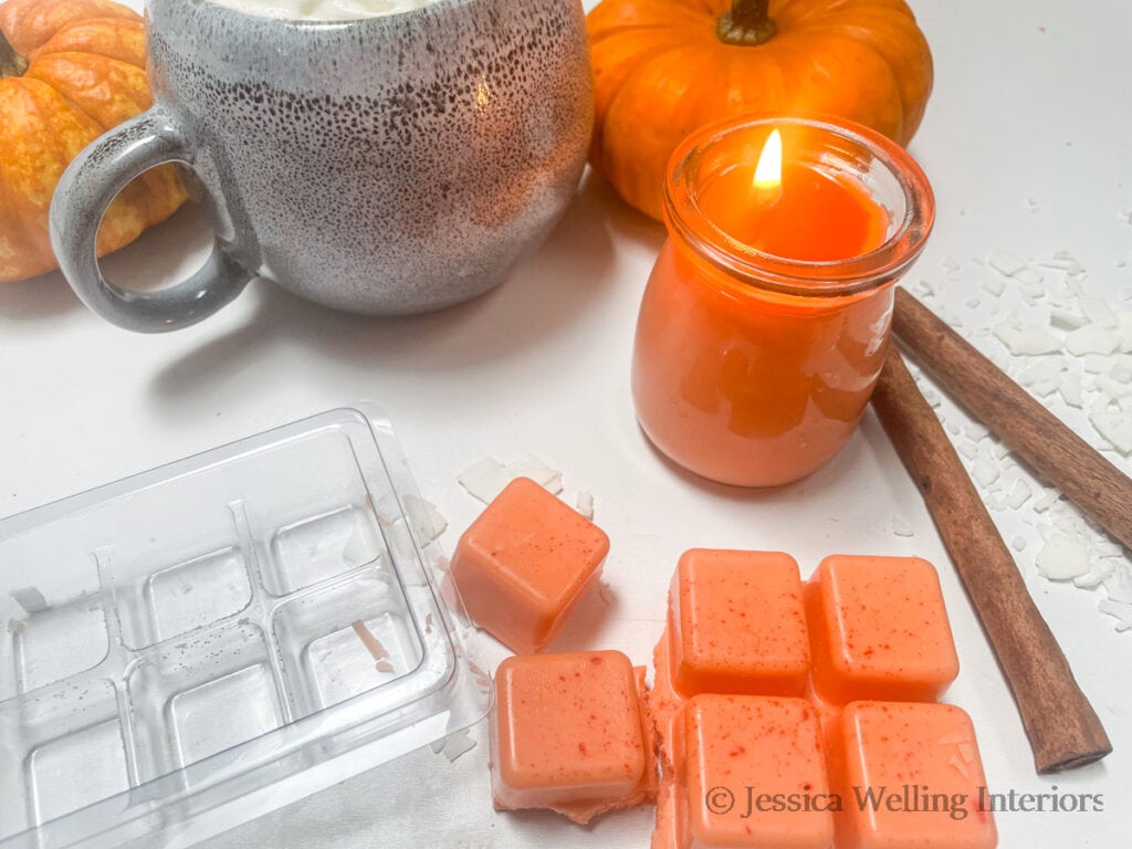 pumpkin spice scented wax melts with a scented candle and pumpkin spice latte