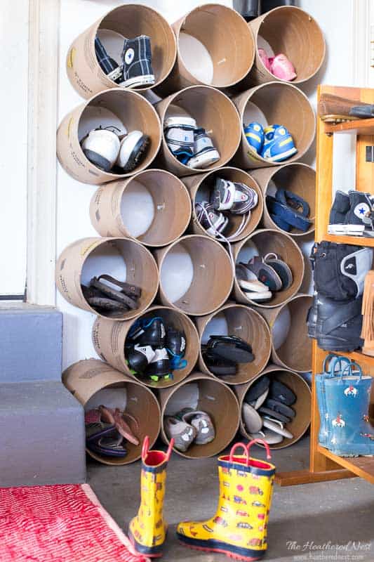 DIY garage shoe storage system made with concrete form tubes
