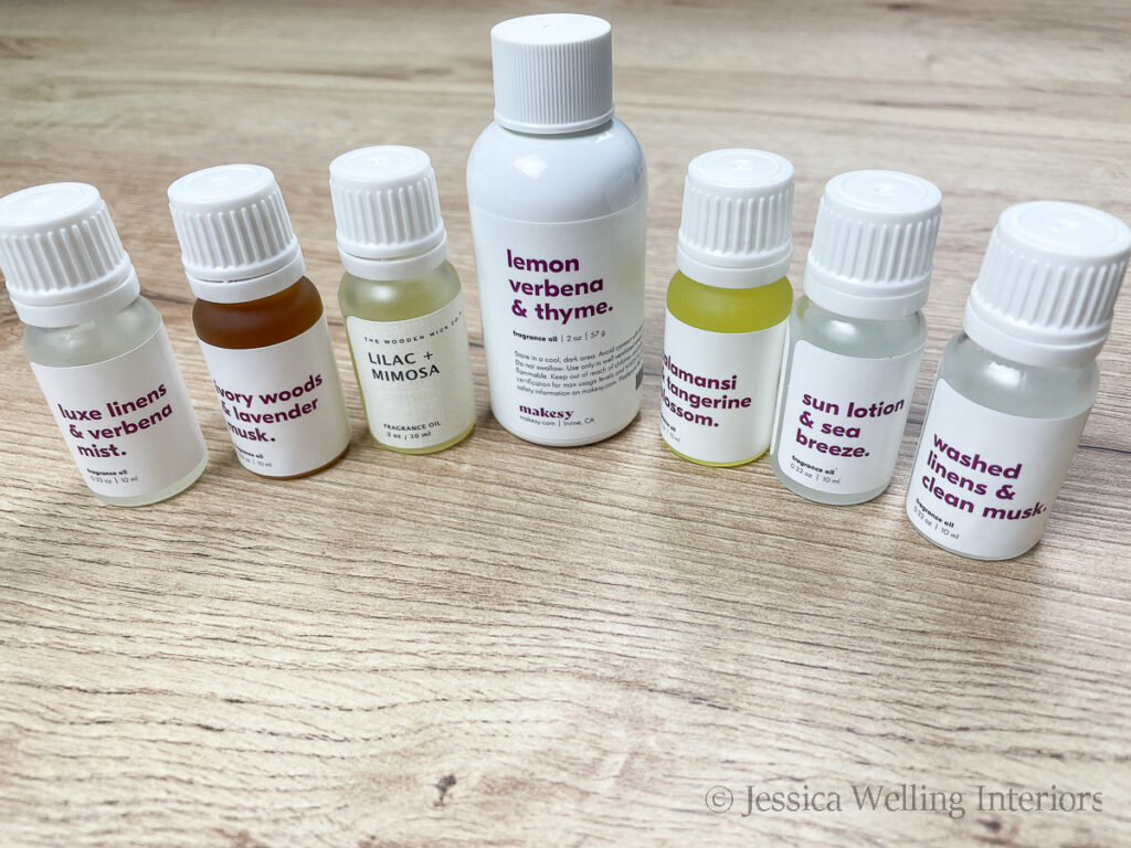 row of 7 different fragrance oils for room spray and DIY linen spray