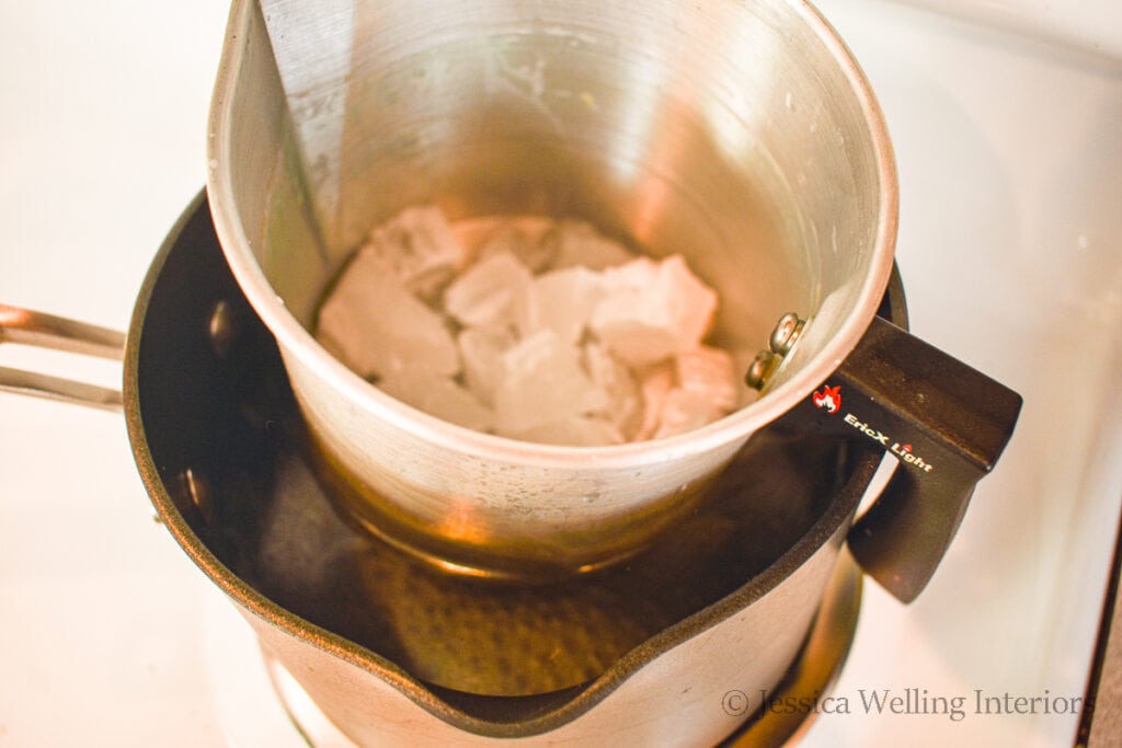 wax melting in a double boiler on the stovetop