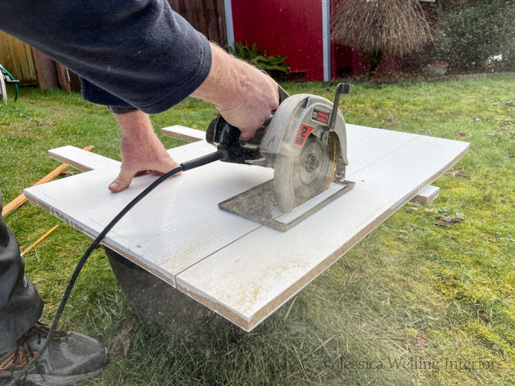 deep pantry shelf being cut with a circular saw