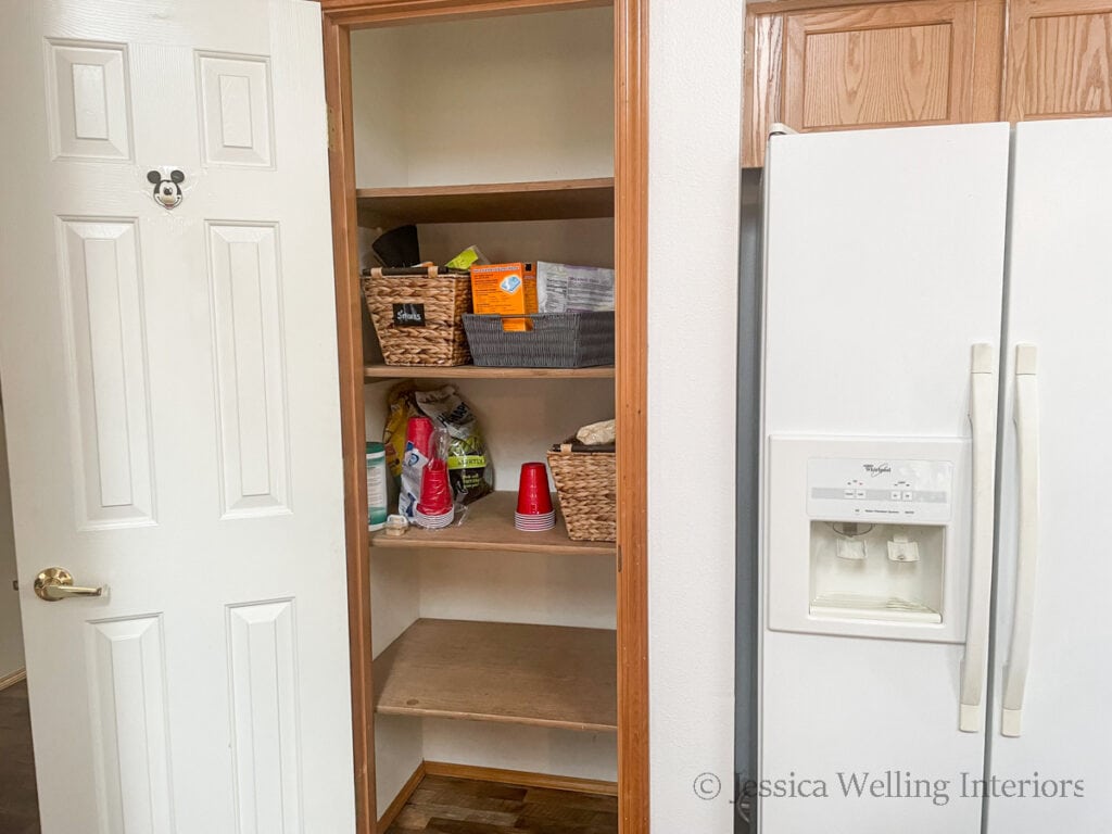 before photo of a pantry with deep shelves