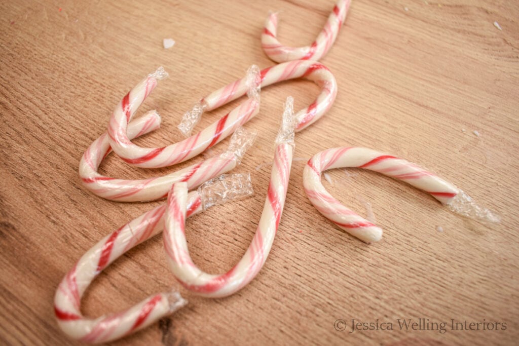 candy canes on a wood background