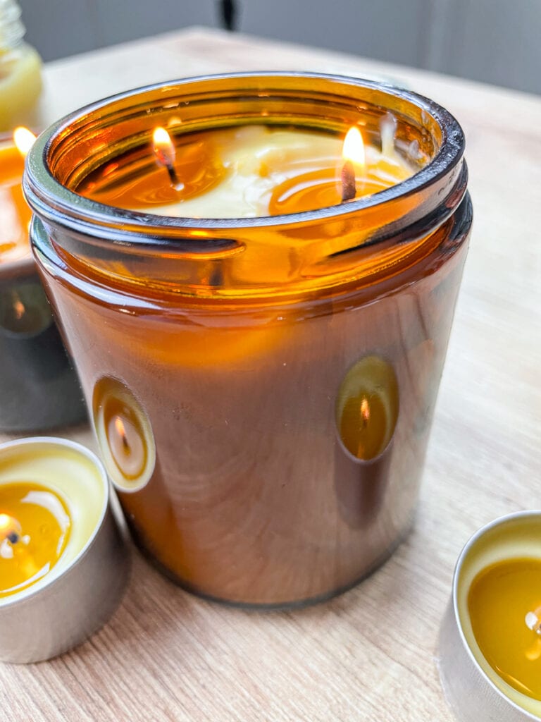 amber glass jar candle burnings